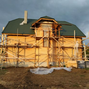 House under construction with scaffolding